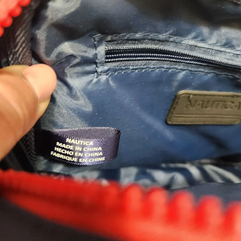 Nautica belt bag or crossbody Navy multi colored letters red zipper